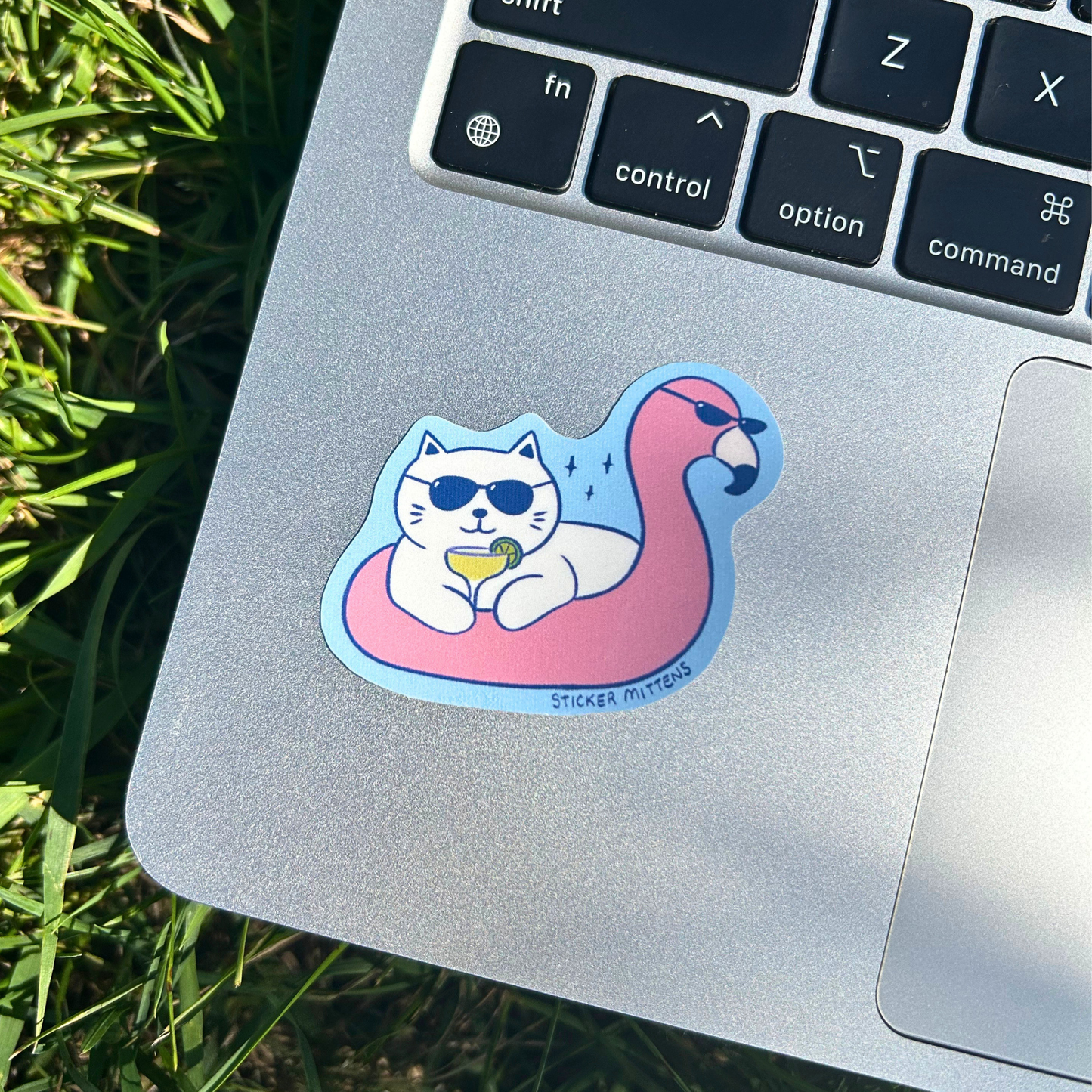 Cat in flamingo tube sticker